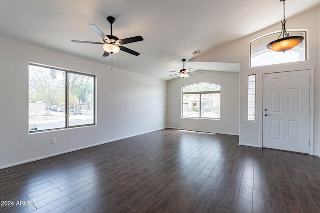 entrance foyer featuring ceiling fan, lofted ceiling, and dark hardwood / wood-style flooring