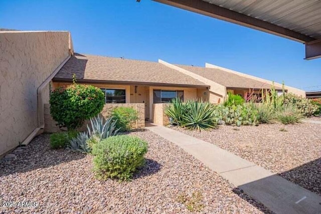 single story home with stucco siding