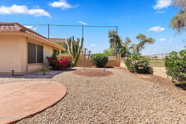 view of yard with fence