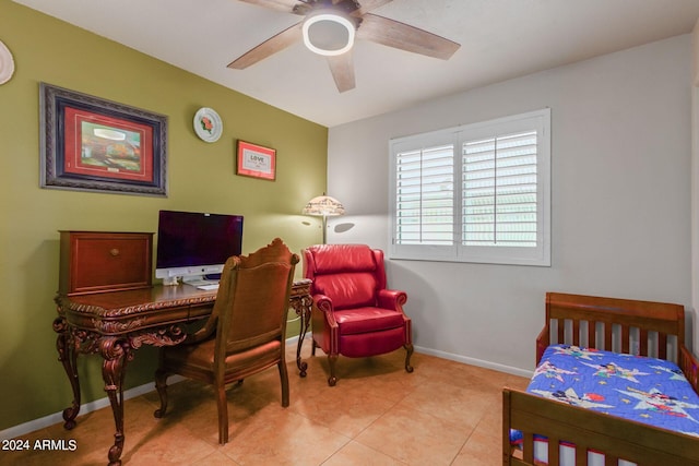 bedroom featuring ceiling fan and light tile patterned floors