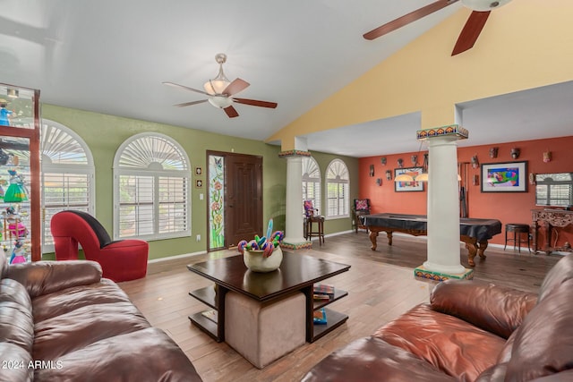 living room with ornate columns, high vaulted ceiling, pool table, ceiling fan, and light hardwood / wood-style floors