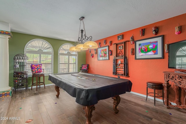 playroom featuring pool table, wood-type flooring, and a textured ceiling