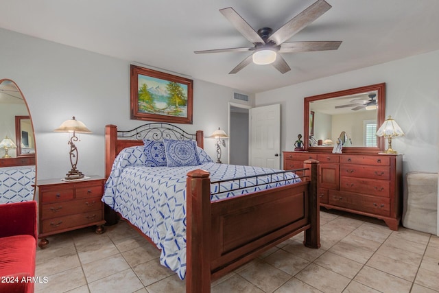 bedroom featuring light tile patterned floors and ceiling fan