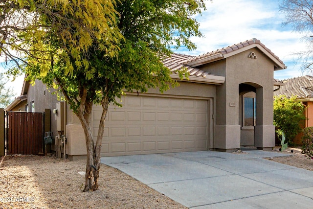 view of front of property featuring a garage