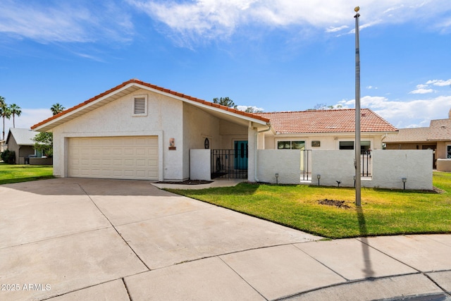 view of front facade featuring a tile roof, stucco siding, concrete driveway, an attached garage, and a gate
