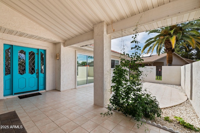view of patio / terrace featuring fence