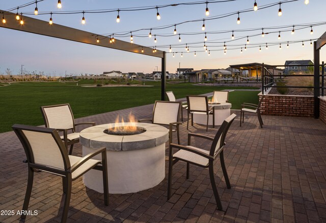 view of patio with an outdoor fire pit