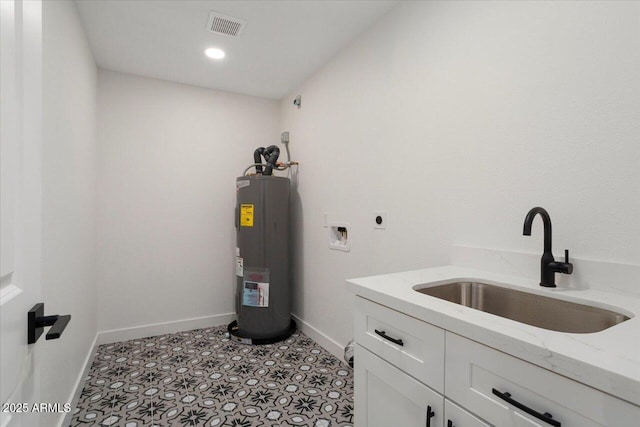 laundry room with sink, cabinets, hookup for a washing machine, electric water heater, and hookup for an electric dryer