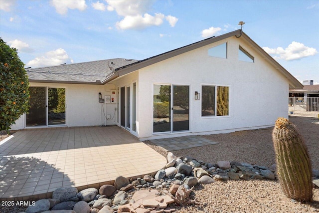 rear view of property with a patio area