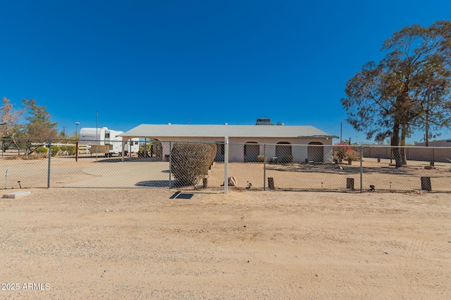 back of property featuring fence