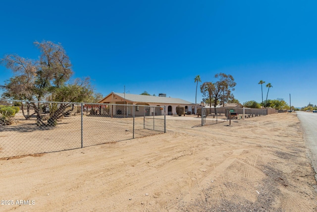 view of front of property featuring fence