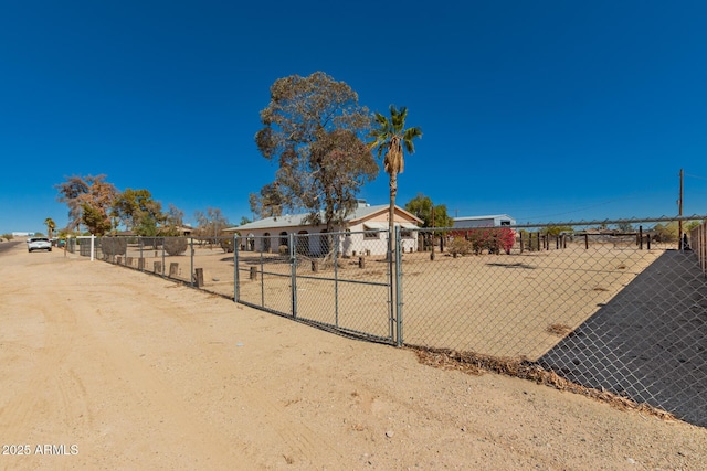 view of community featuring fence