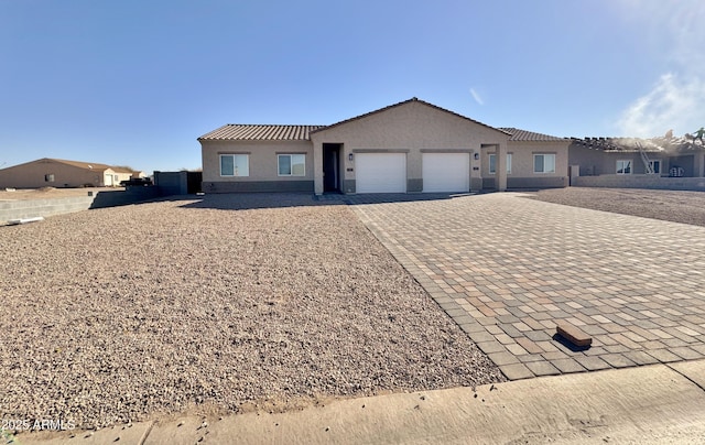 view of front of home featuring a garage