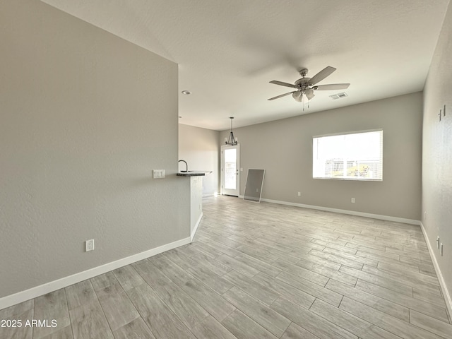 spare room featuring ceiling fan