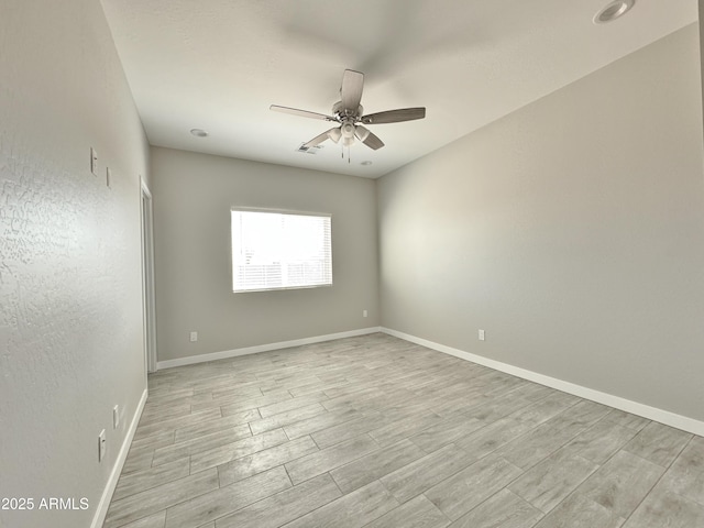 unfurnished room featuring ceiling fan