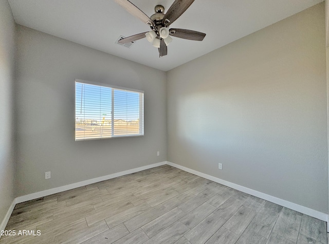 unfurnished room with light hardwood / wood-style flooring and ceiling fan