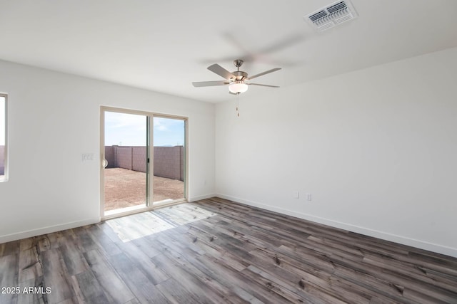21999 E Wayward Ln, Red Rock, AZ 85145 - unfurnished room featuring wood finished floors and ceiling fan