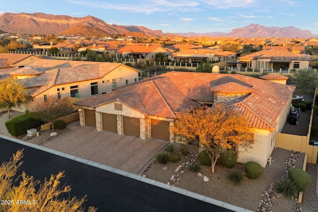aerial view with a mountain view and a residential view