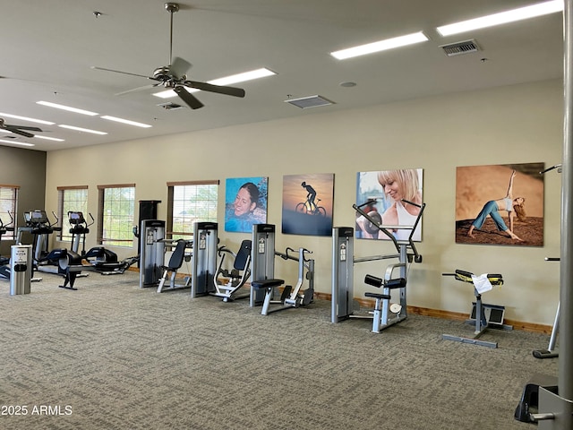 gym featuring visible vents, carpet floors, and a ceiling fan