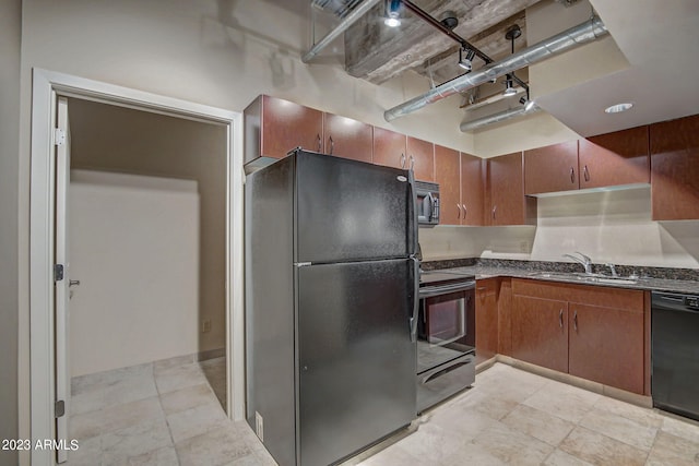 kitchen featuring black appliances and sink