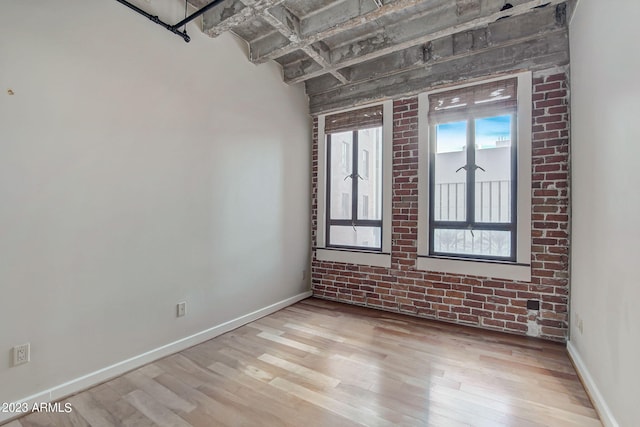 empty room with light wood-type flooring