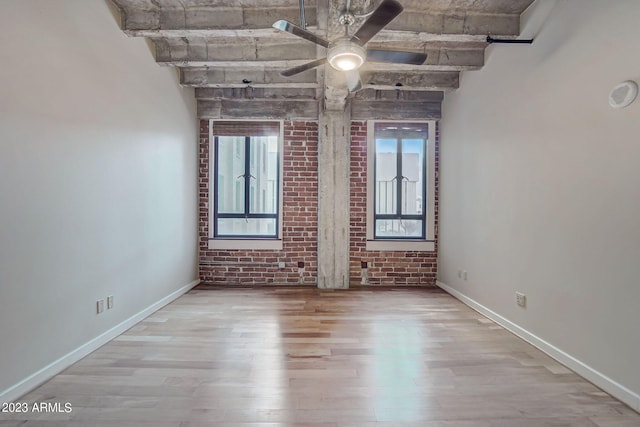 spare room with ceiling fan and light hardwood / wood-style floors