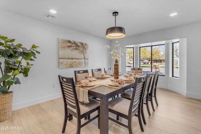 dining room featuring light wood-type flooring