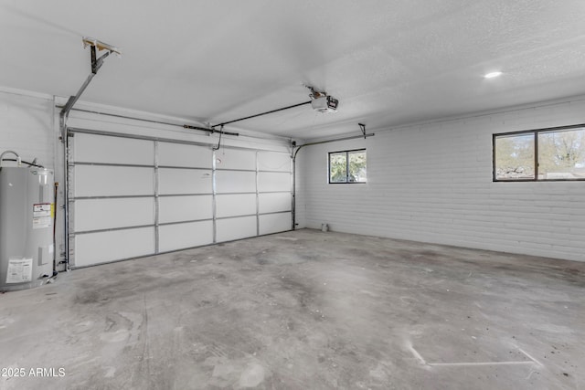 garage with a garage door opener and electric water heater