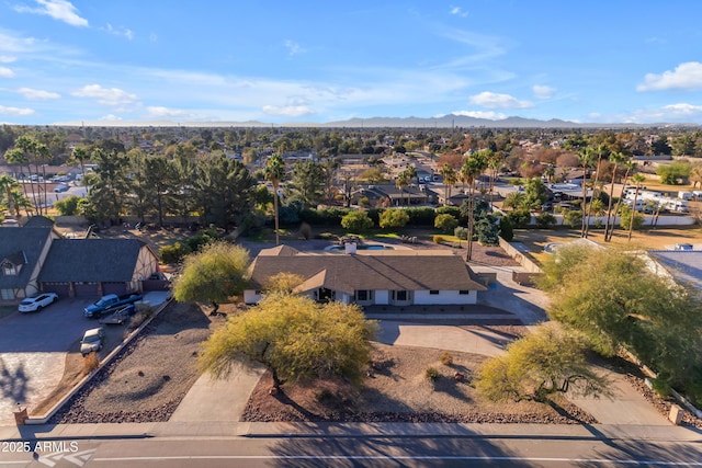 drone / aerial view featuring a mountain view