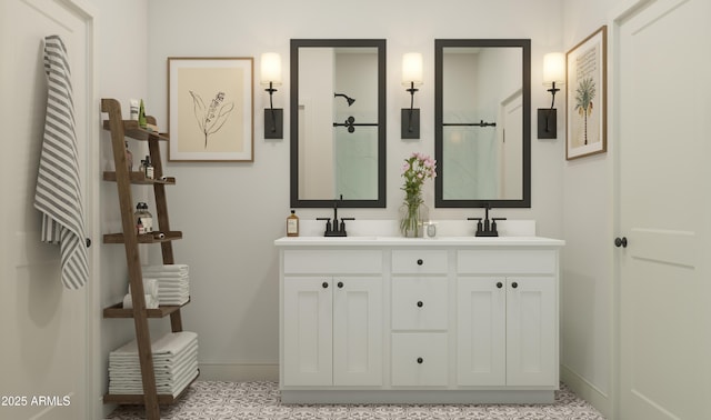 42405 W Peters Dr, Maricopa, AZ 85138 - full bath with baseboards, double vanity, and a shower