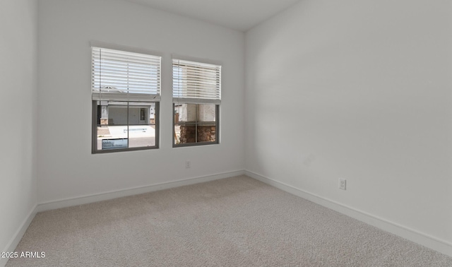 42405 W Peters Dr, Maricopa, AZ 85138 - unfurnished room with carpet floors and baseboards