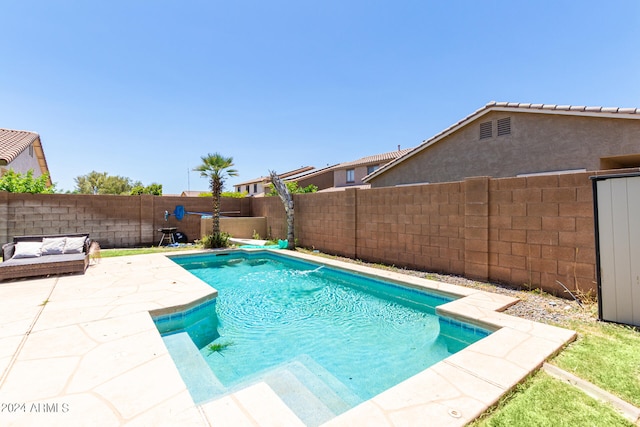 view of pool featuring a patio area