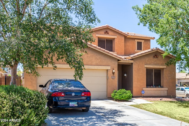 view of front of property featuring a garage