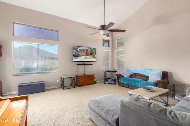 living room with carpet flooring, high vaulted ceiling, and ceiling fan