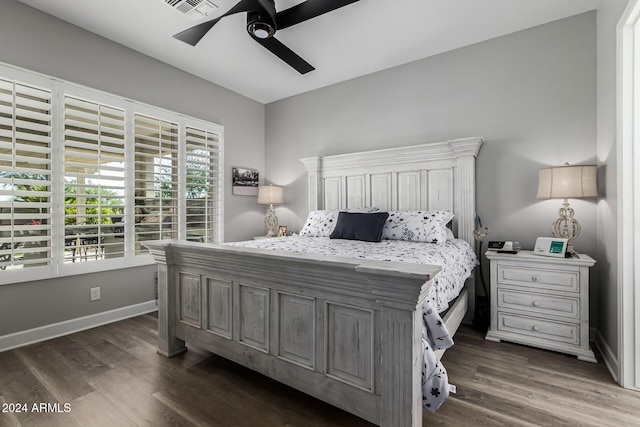 bedroom featuring dark wood-type flooring and ceiling fan