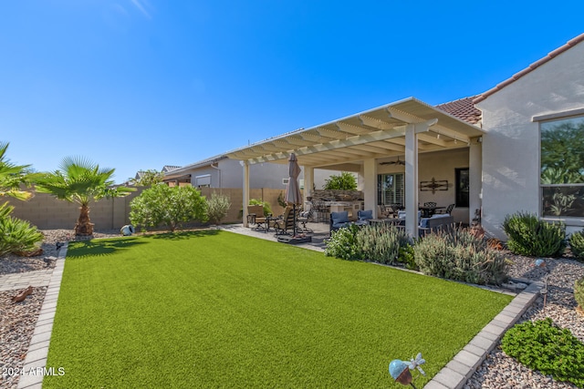 view of yard with a pergola and a patio area