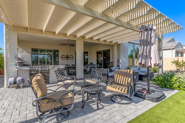 view of patio / terrace with a pergola and ceiling fan