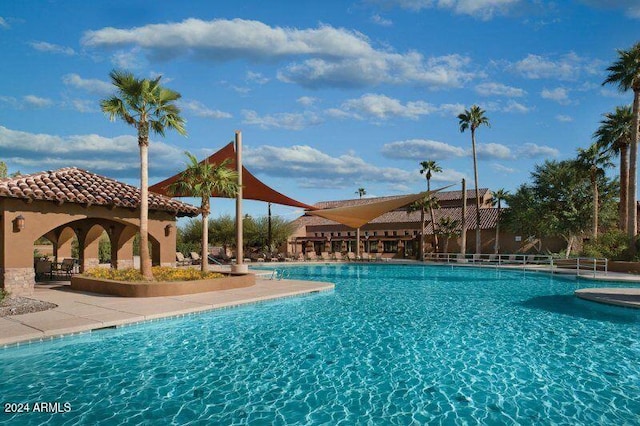 view of pool featuring a patio area