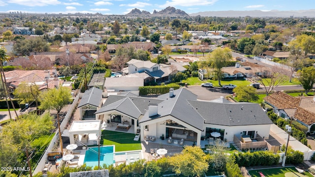 aerial view with a mountain view and a residential view