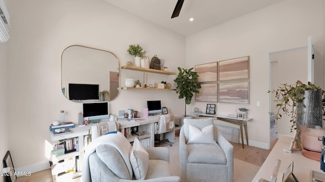 home office featuring recessed lighting, baseboards, light wood-type flooring, and a ceiling fan