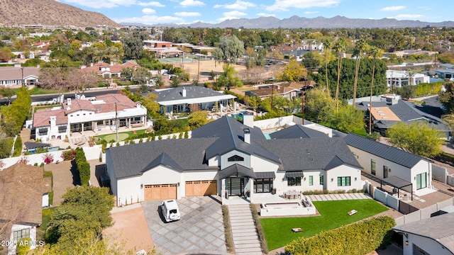 bird's eye view featuring a mountain view and a residential view