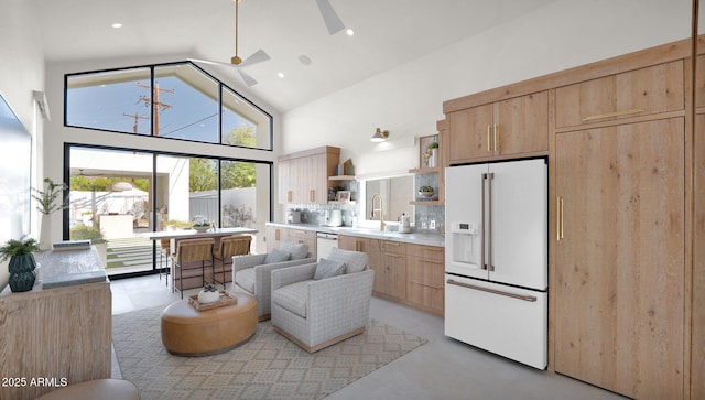 living room with ceiling fan, recessed lighting, concrete floors, and high vaulted ceiling