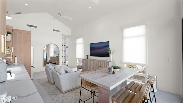 living area with plenty of natural light and visible vents