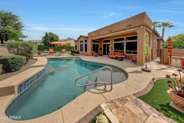 view of pool featuring a patio area, fence, and a fenced in pool