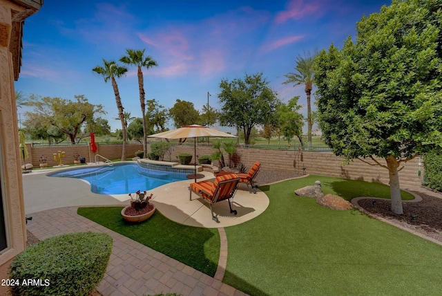 view of pool featuring a fenced backyard, a fenced in pool, and a patio