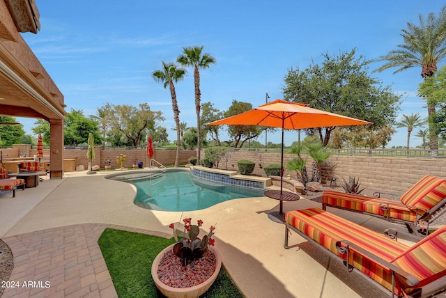 view of swimming pool with a fenced in pool, a patio area, and a fenced backyard