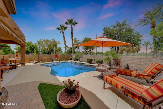 view of swimming pool featuring a fenced in pool, a patio area, and a fenced backyard