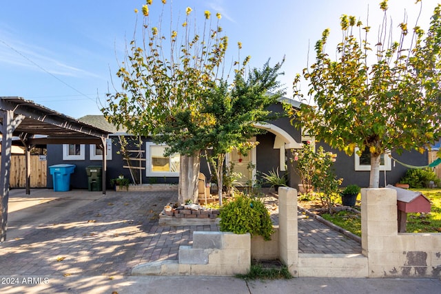 view of property hidden behind natural elements