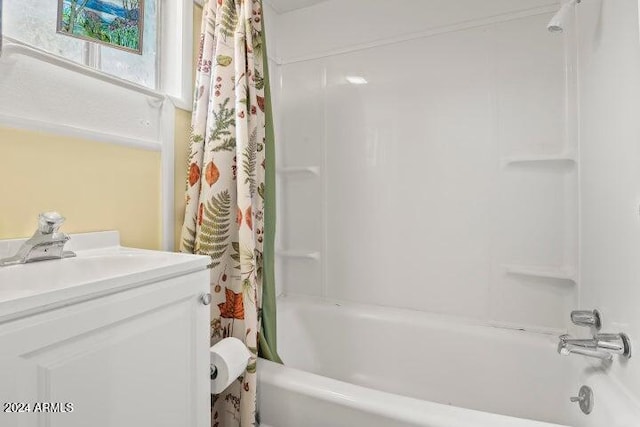 bathroom with shower / bath combo