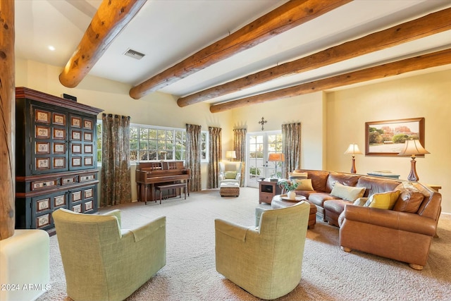 carpeted living room with beam ceiling